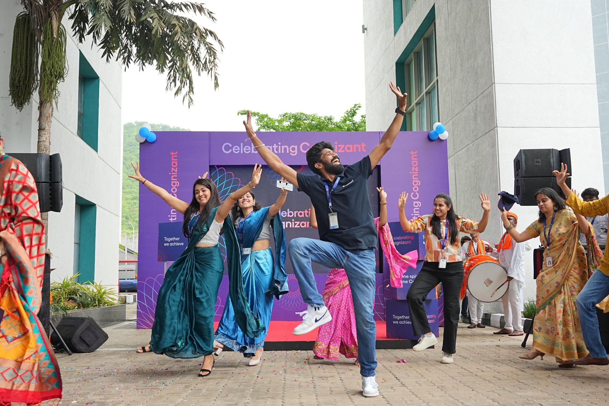 a group of people jumping in the air