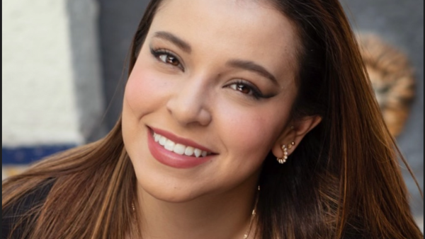 a person smiling at the camera