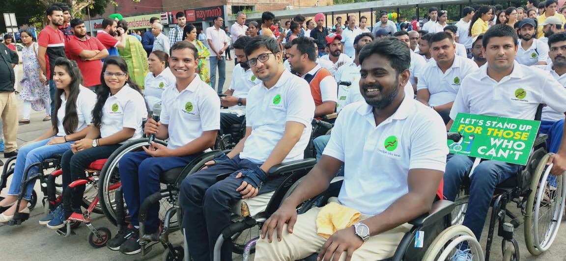 a group of people in wheelchairs