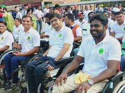 a group of people in wheelchairs