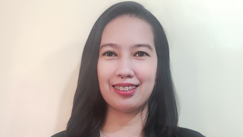 a person smiling for a picture