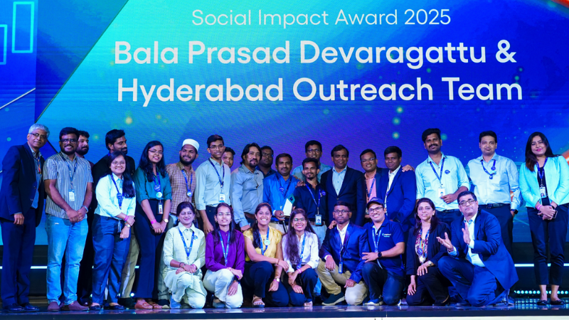 a group of people posing for a photo