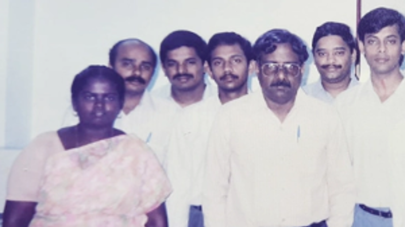 a group of people posing for a photo