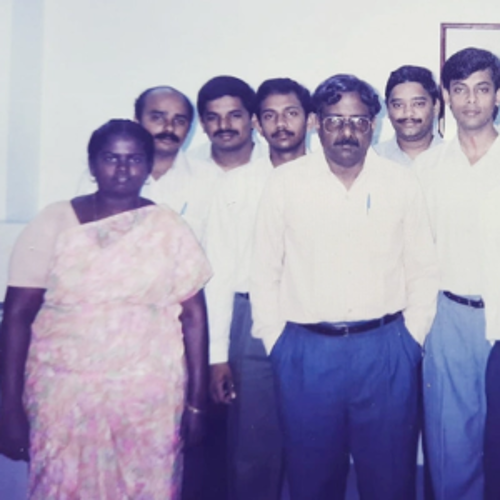 a group of people posing for a photo