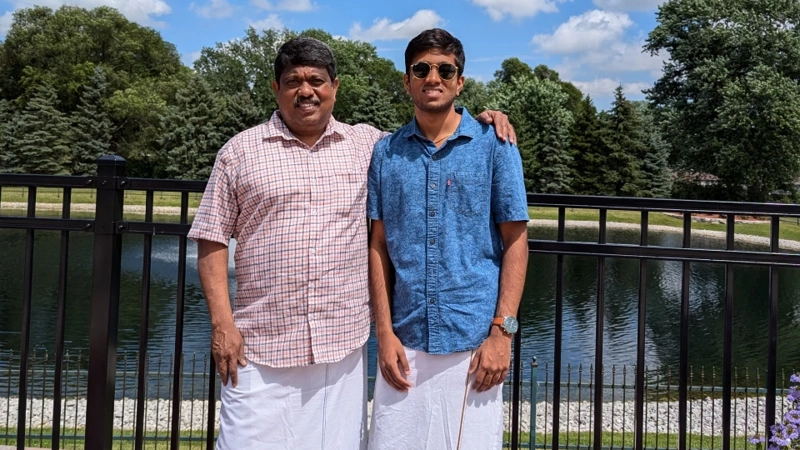 two men standing next to each other