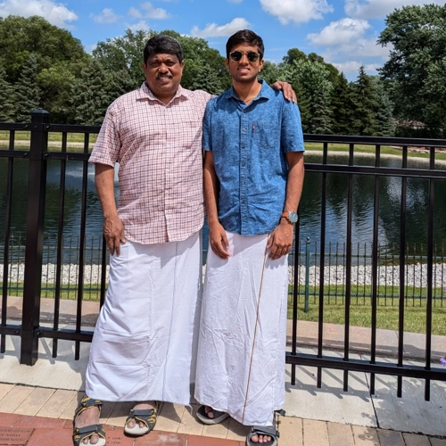 two men standing next to each other