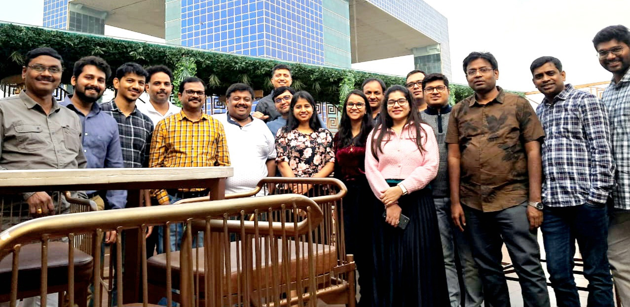 a group of people posing for a photo