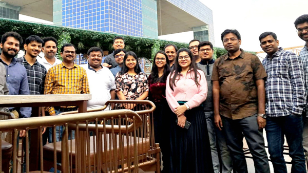 a group of people posing for a photo