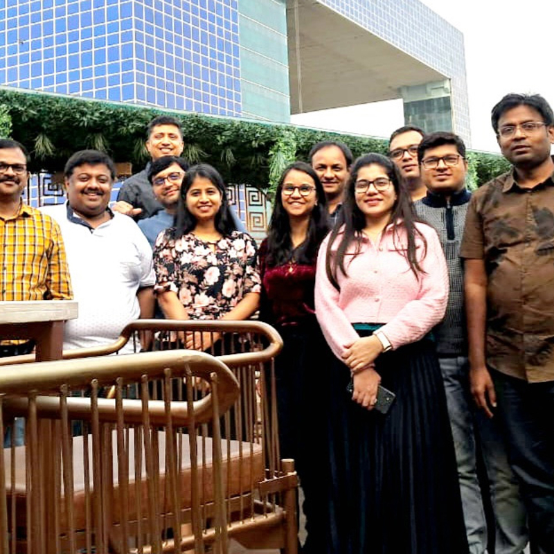 a group of people posing for a photo