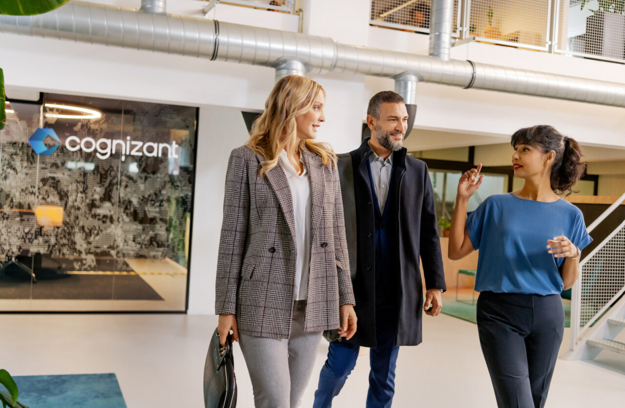 a group of people walking in a building