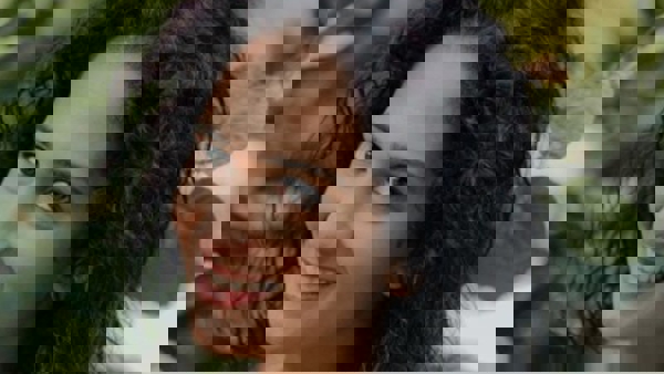 a person smiling at the camera