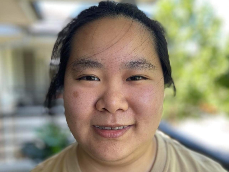 a person smiling for a selfie