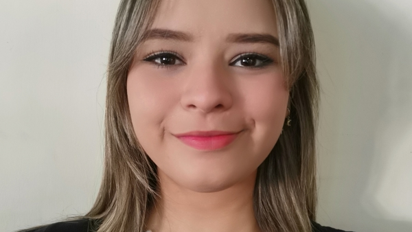 a person smiling for a selfie