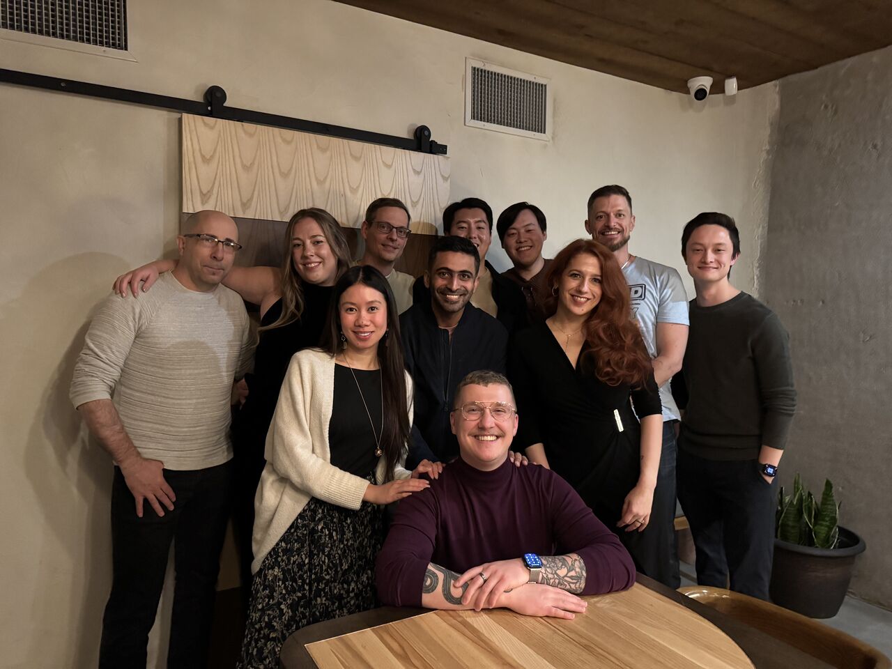 a group of people posing for a photo