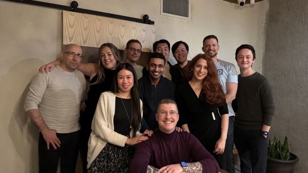 a group of people posing for a photo
