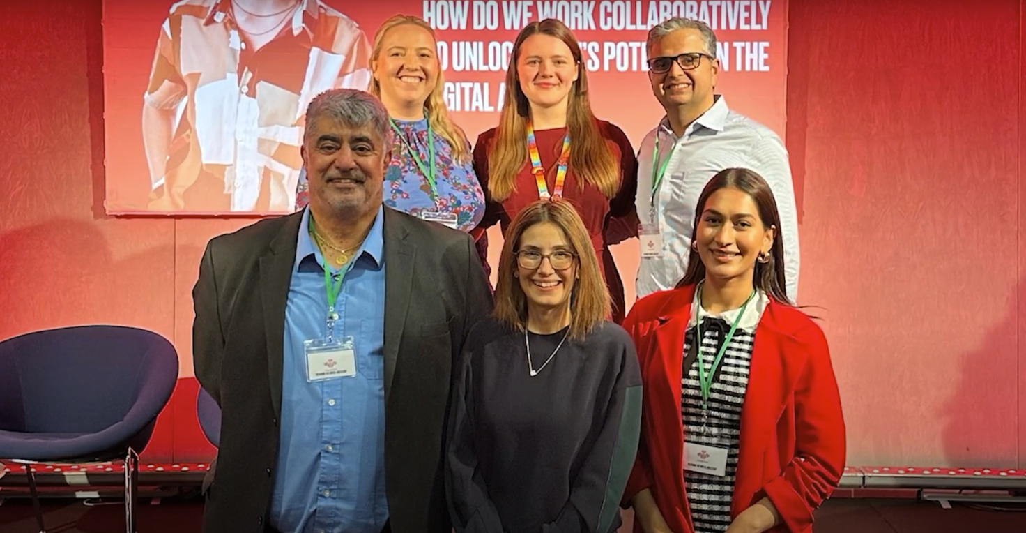 a group of people posing for a photo