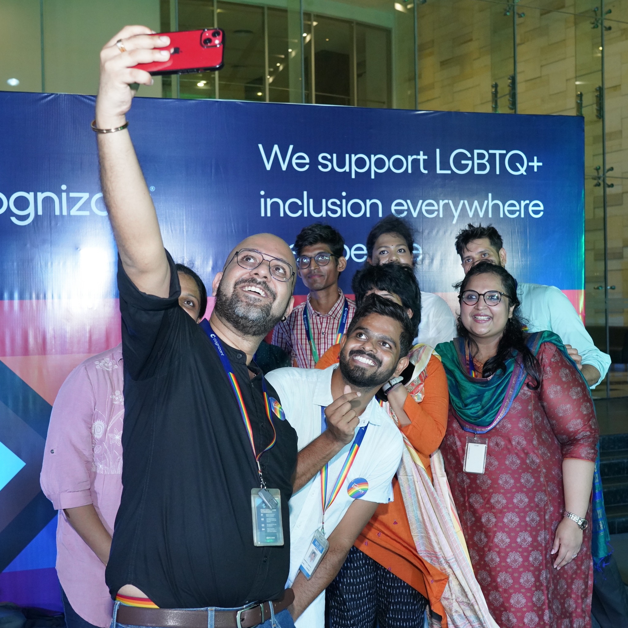 a group of people taking a selfie