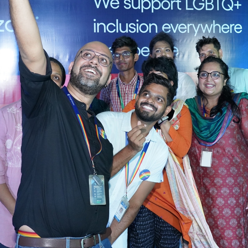 a group of people taking a selfie