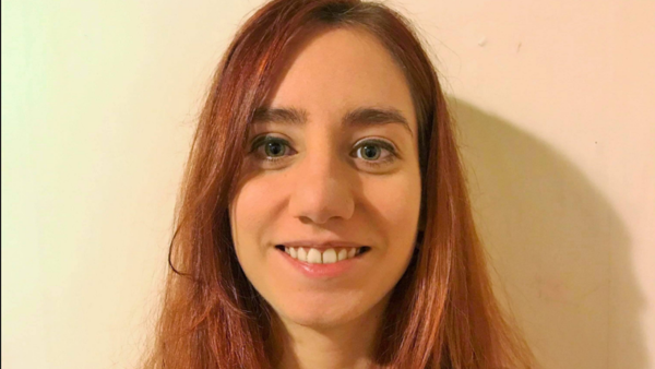 a person smiling at the camera