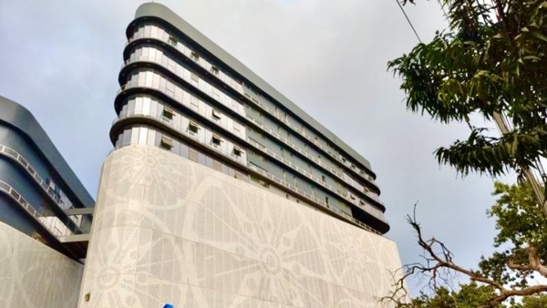 a building with a white wall