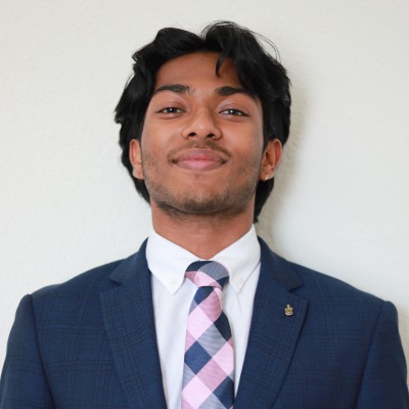 a person in a suit and tie