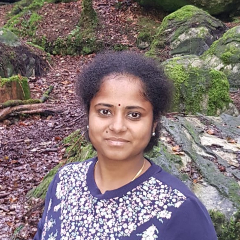 a person smiling at the camera