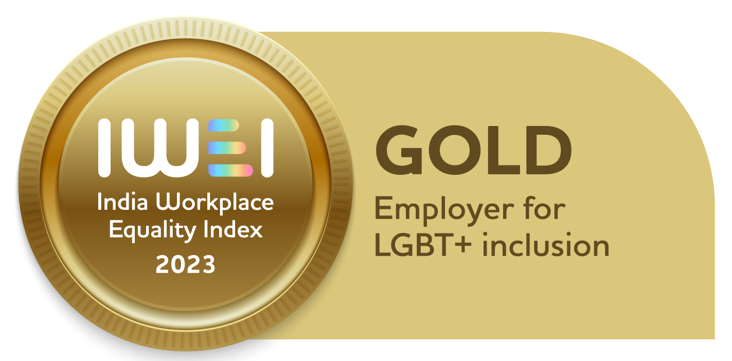 a gold badge with text and a black background