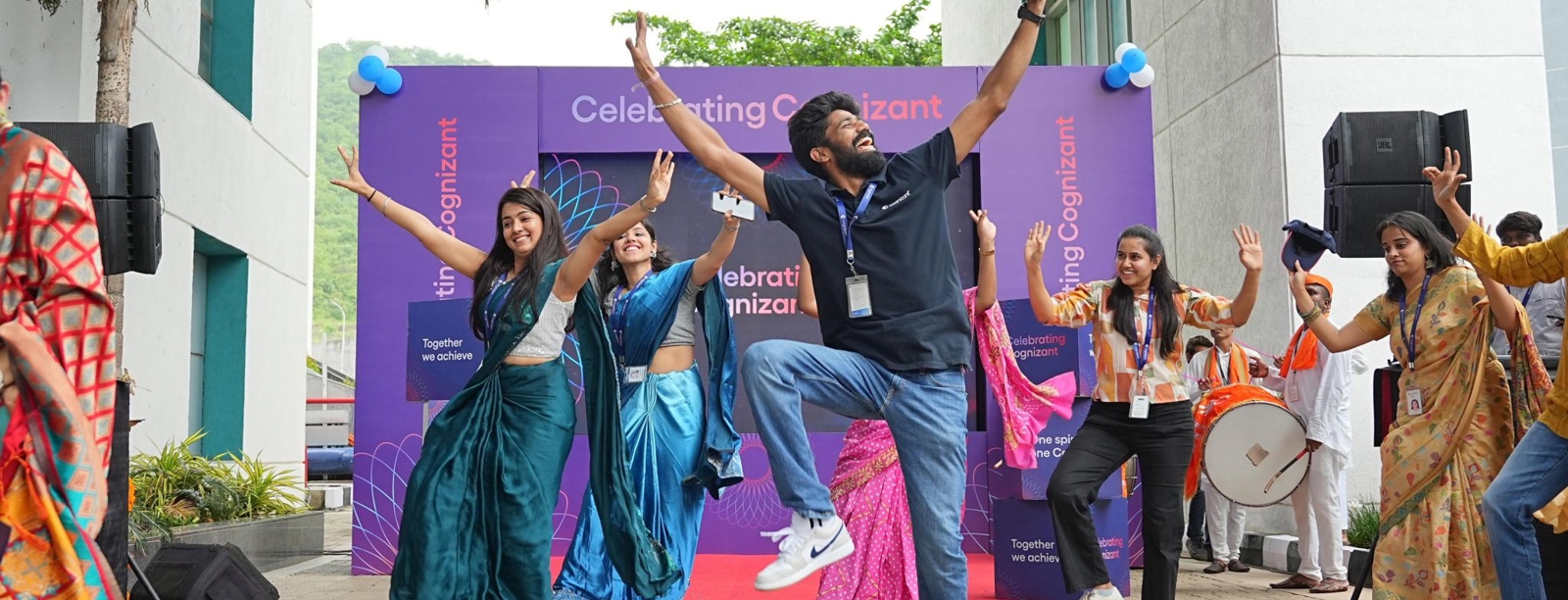 a group of people jumping in the air