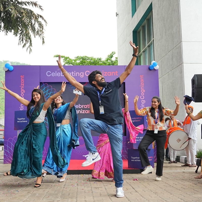 a group of people jumping in the air
