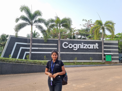 a person standing in front of a sign