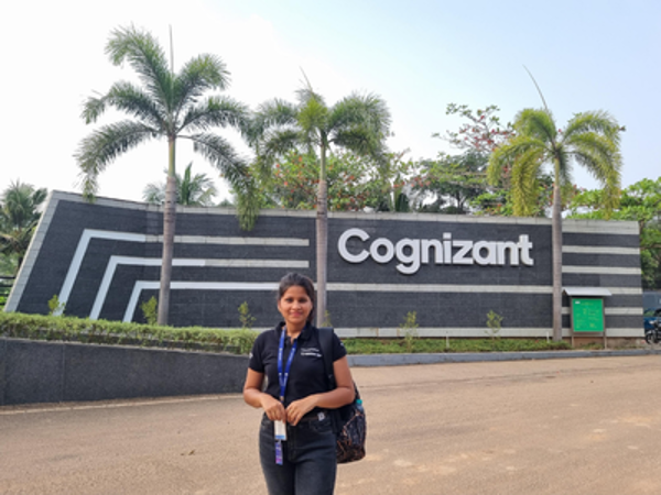 a person standing in front of a sign