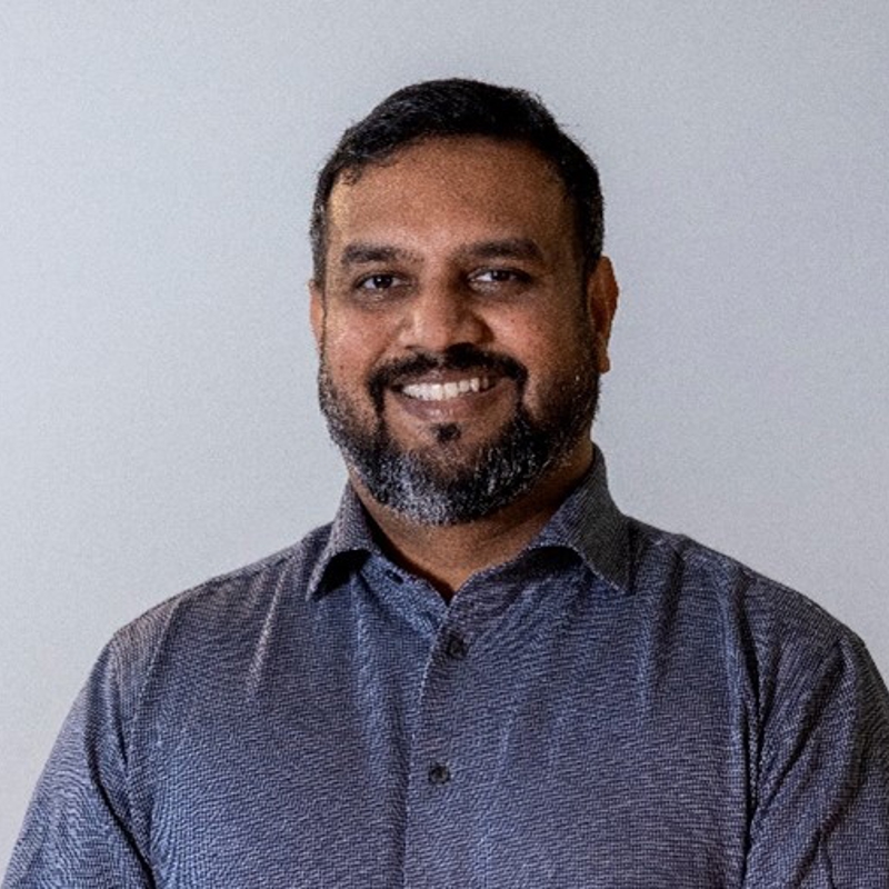 a person smiling for a picture