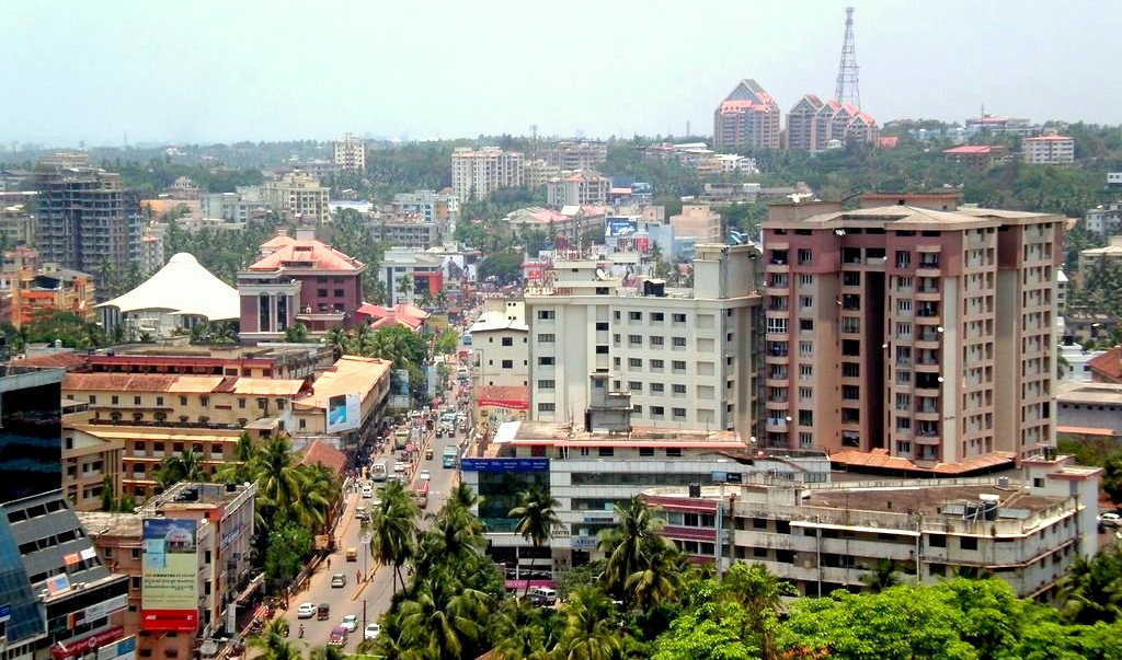 a city with persony buildings and trees