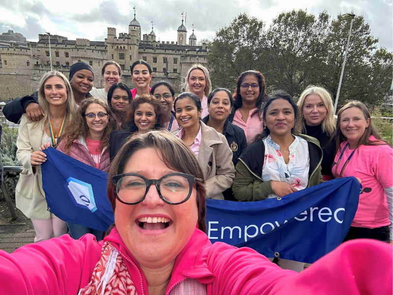a group of women posing for a photo