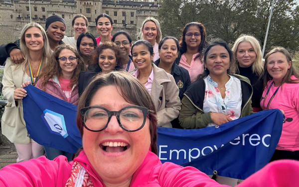 a group of women posing for a photo