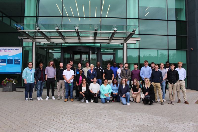 a group of people posing for a photo