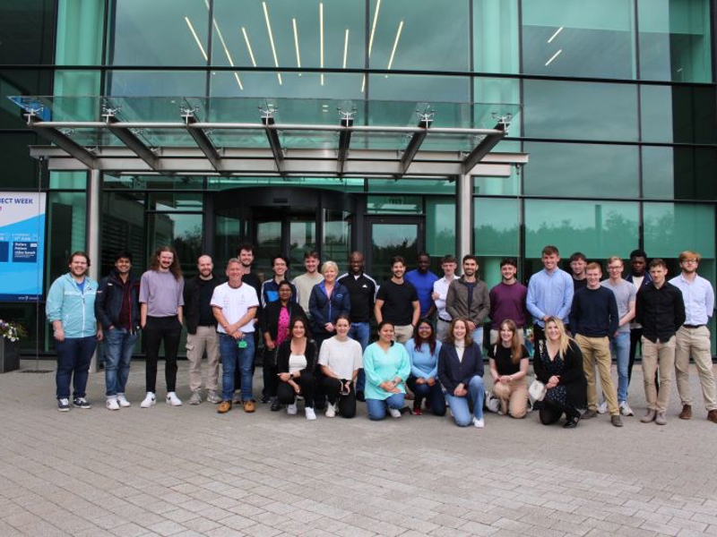 a group of people posing for a photo