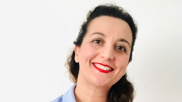a person smiling at camera