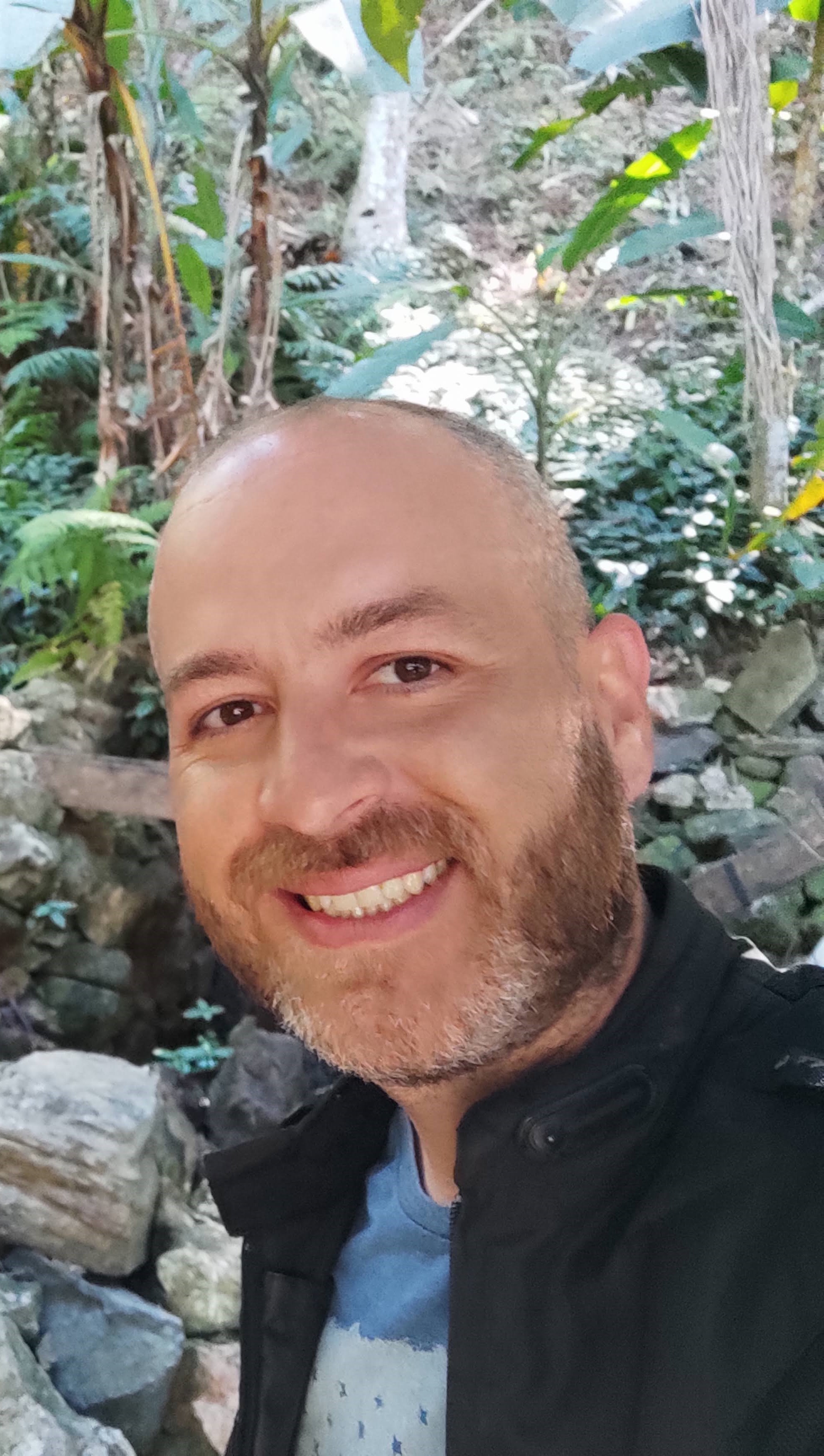 a person smiling for the camera