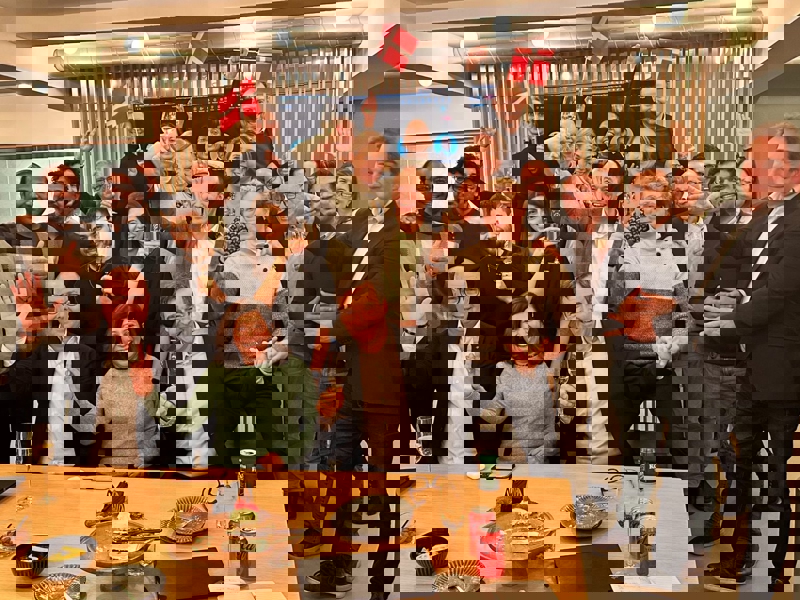 a group of people posing for a photo