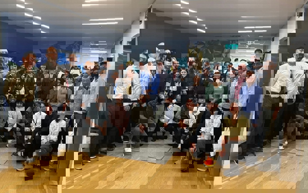 a group of people posing for a photo