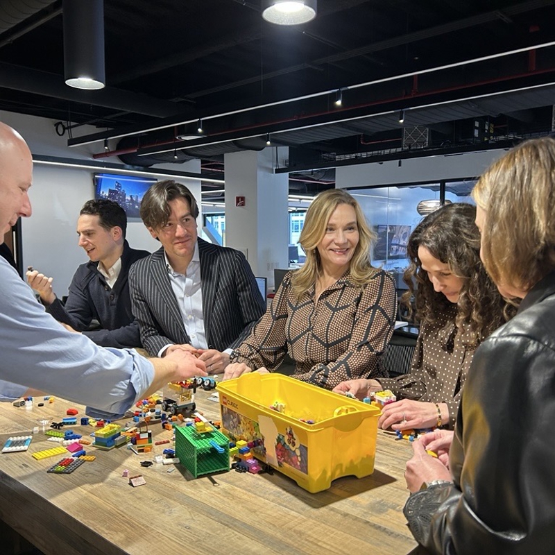 a group of people around a table