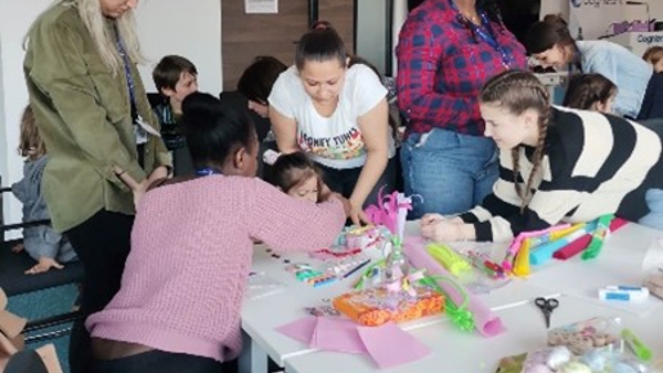 a group of people around a table