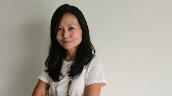 a person with her arms crossed