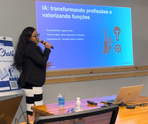 a person standing in front of a projector screen