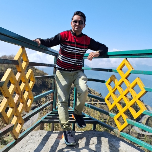a person posing on a railing