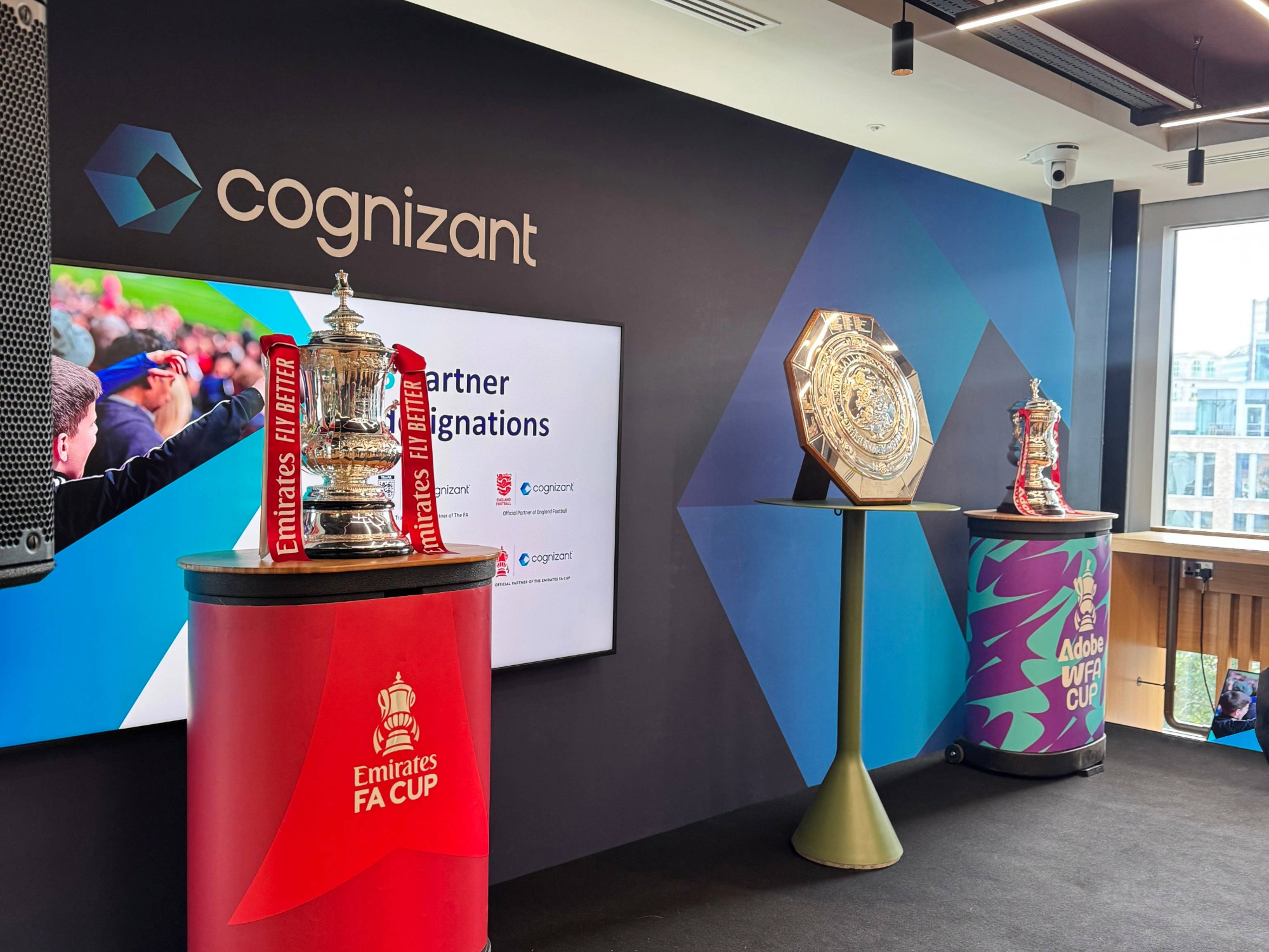 a group of trophies on pedestals