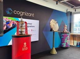 a group of trophies on pedestals