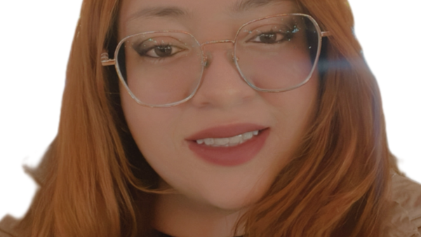 a person with red hair wearing glasses