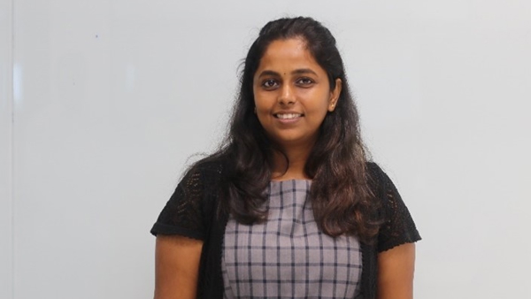 a person smiling at camera